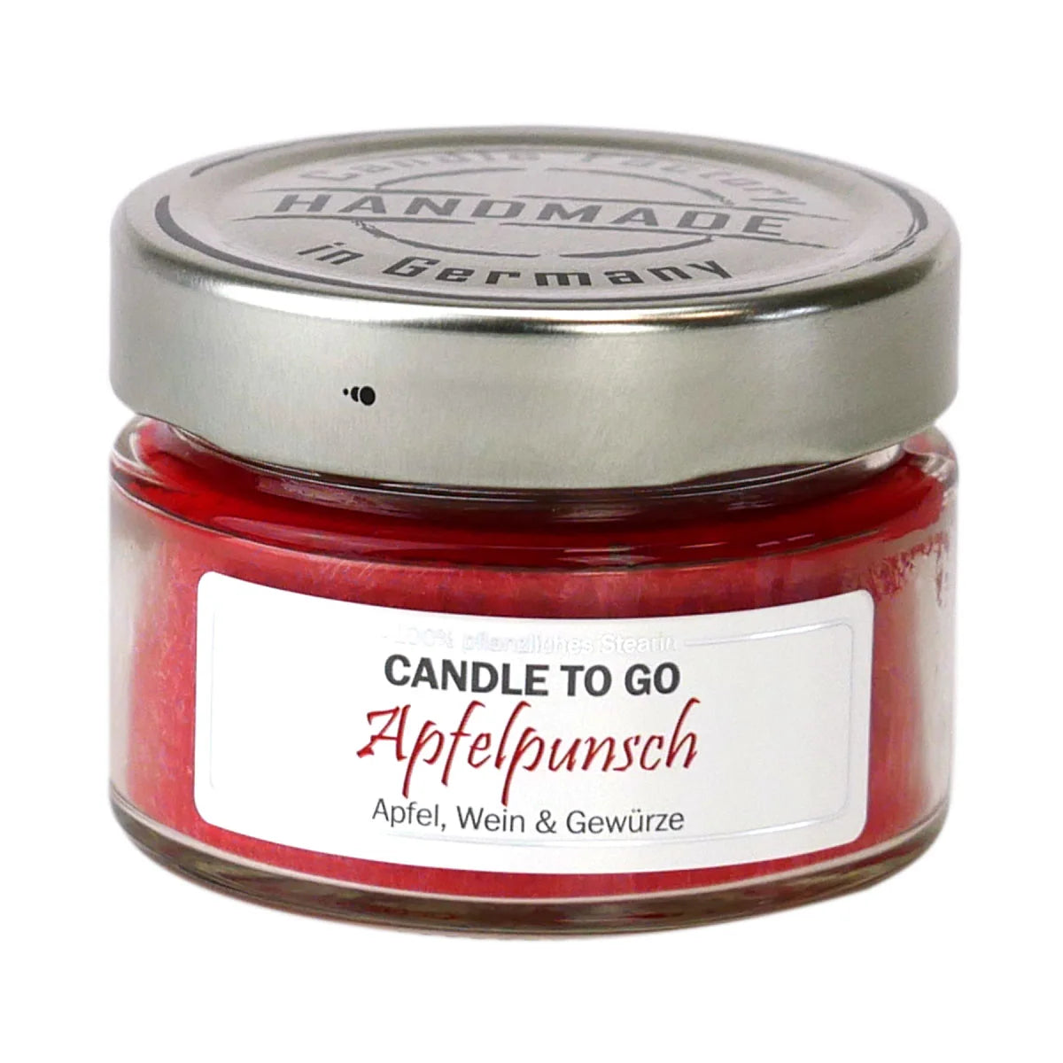 Rote Candle To Go Kerze Apfelpunsch im Glas auf weißem Hintergrund