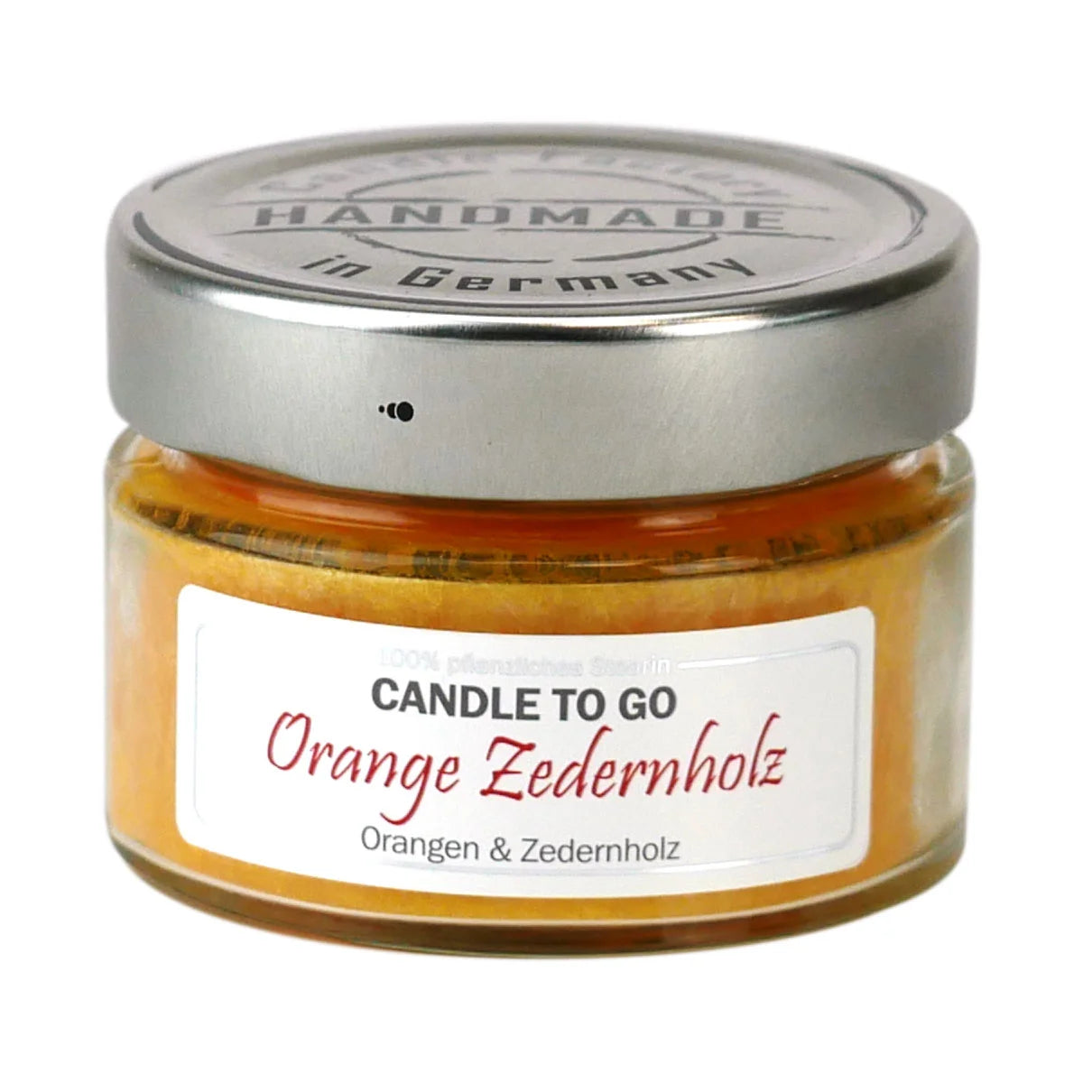 Orangene Candle To Go Orange Zedernholz Kerze im Glas auf weißem Hintergrund